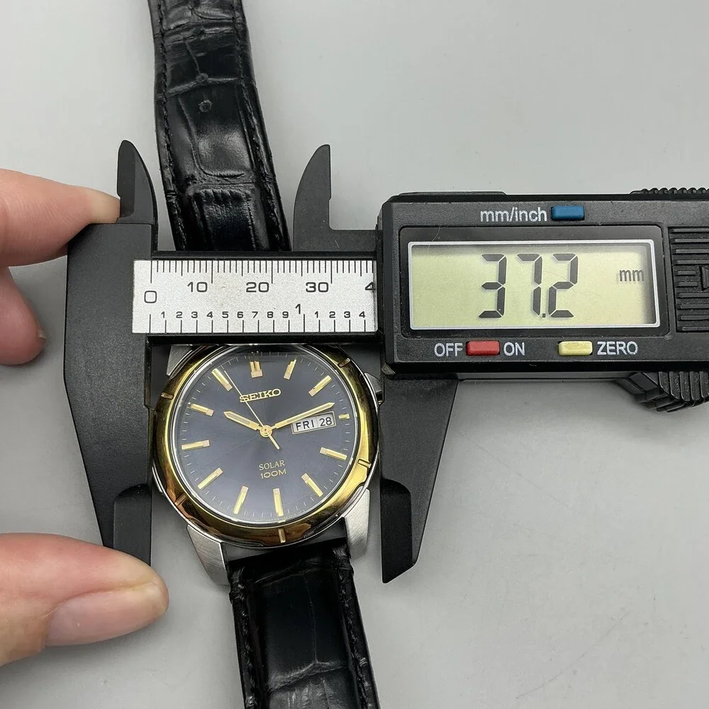 Seiko Solar Mens Watch 37mm Blue Dial Two Tone Black Leather Day Date V158-0AD0